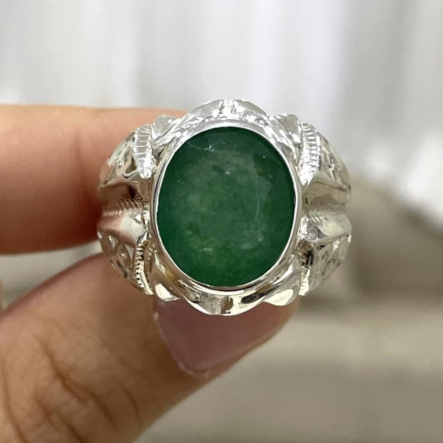 Men's silver ring with an emerald stone