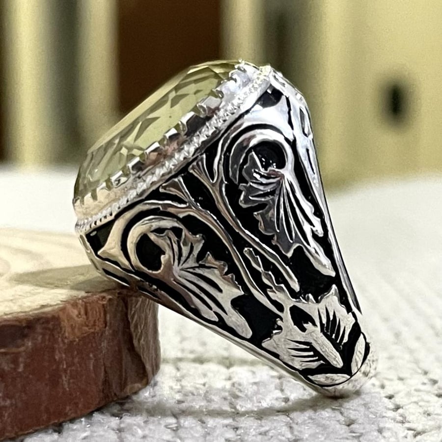Men's silver ring with a sapphire stone