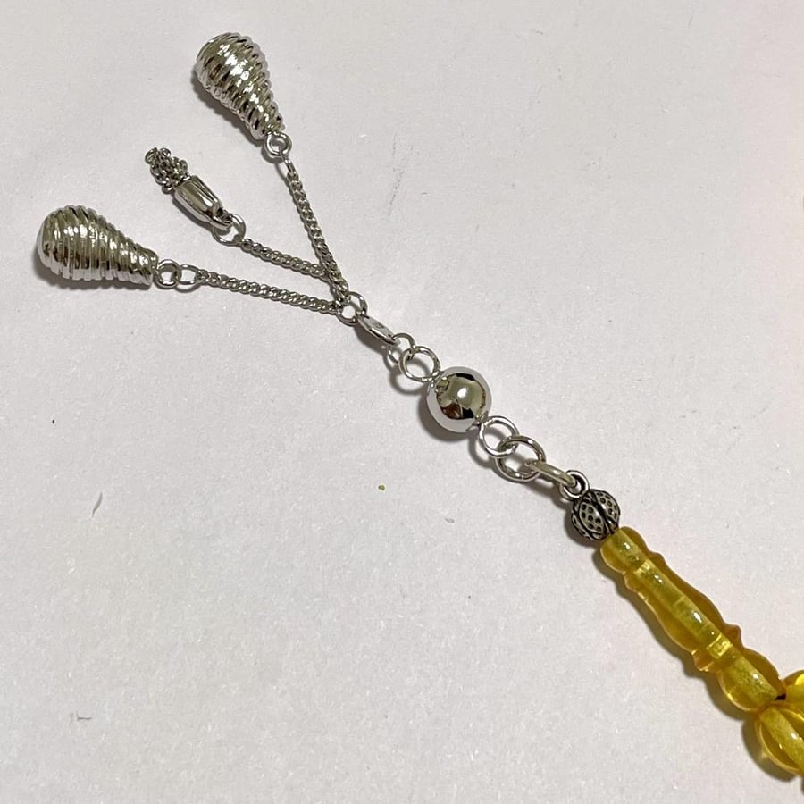 Amber-colored clay prayer beads, 99 beads, silver block