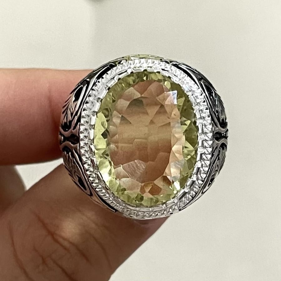 Men's silver ring with a sapphire stone