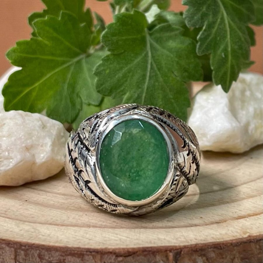 Men's silver ring with an emerald stone