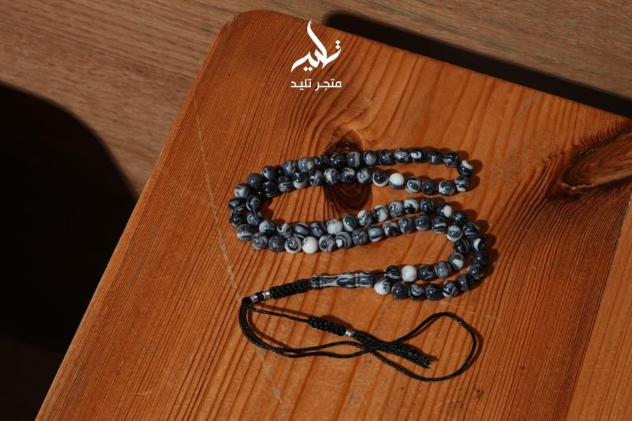 مسباح بكلايت أبيض/أسود مموج