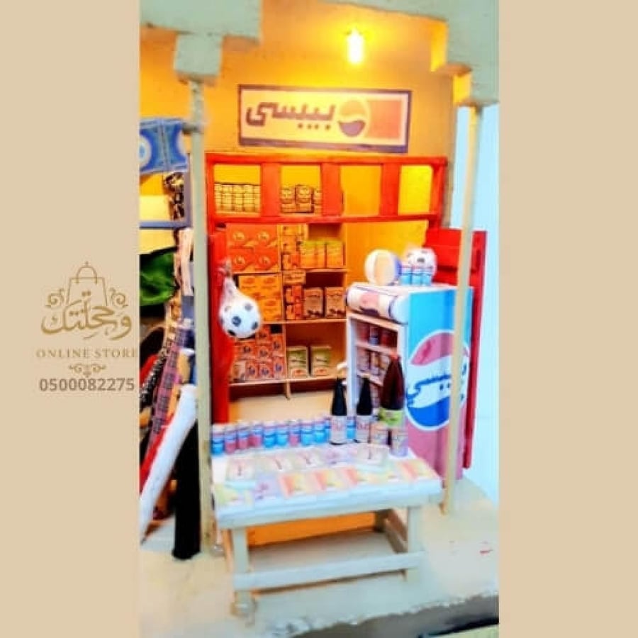 مجسم السوق الشعبي القديم بإضاءة داخلية