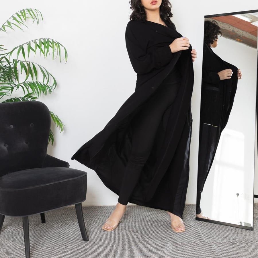 Black abaya with embroidered buttons and pockets on the side N1073