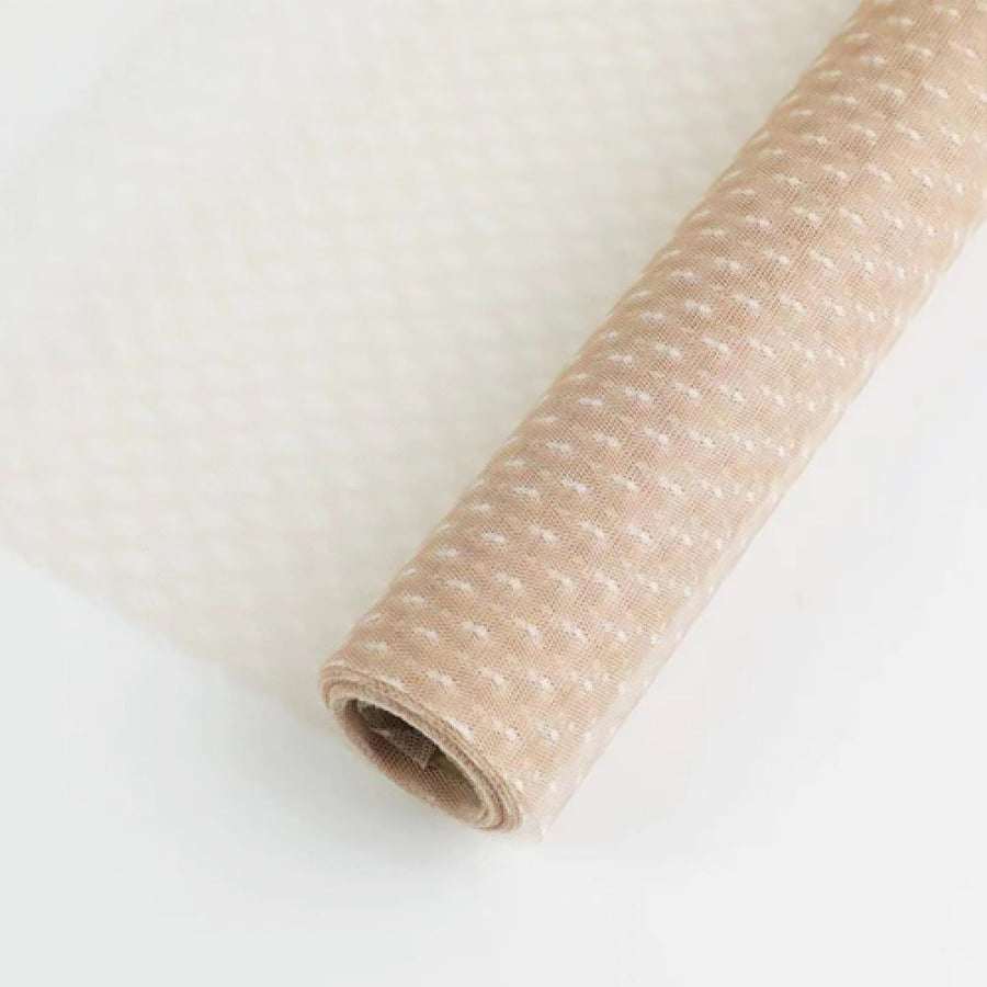 Beige dotted burlap roll