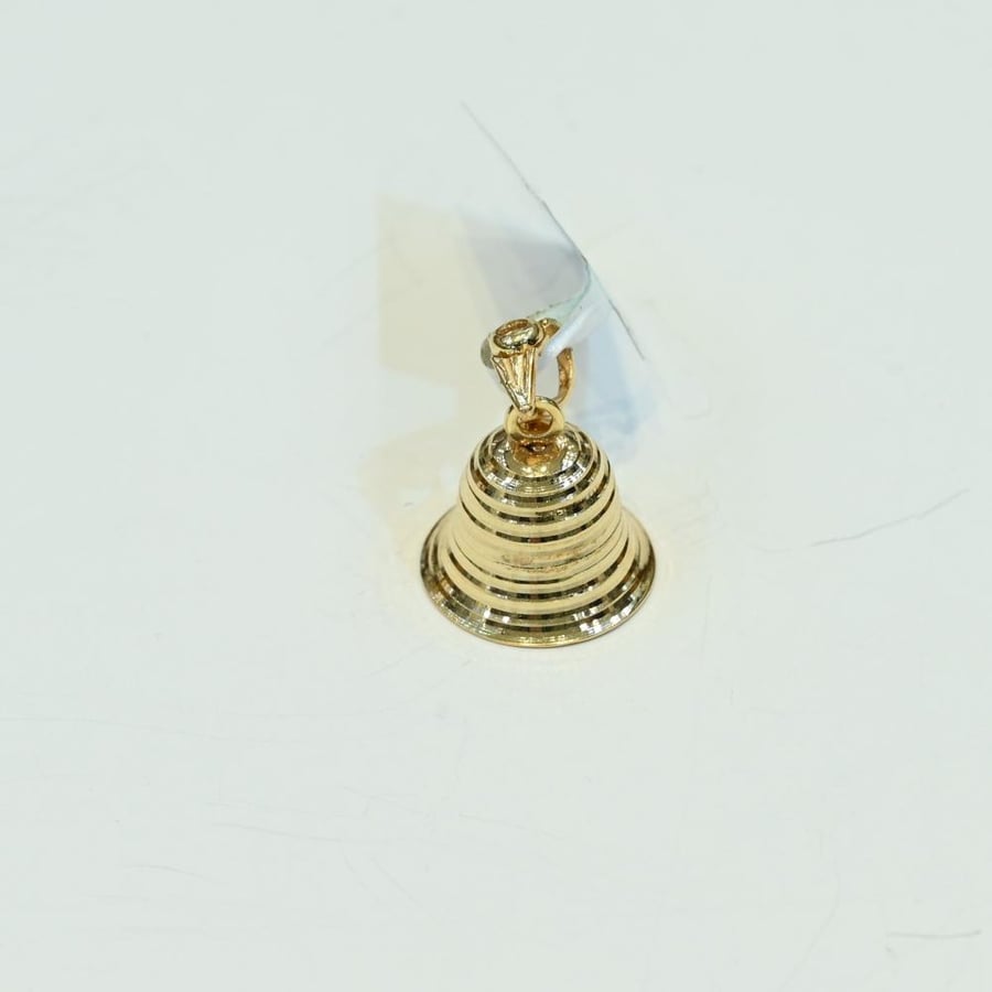 Gold pendant with bell
