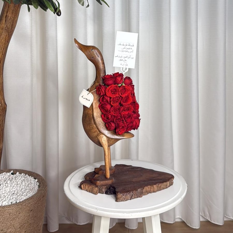 Duck with roses