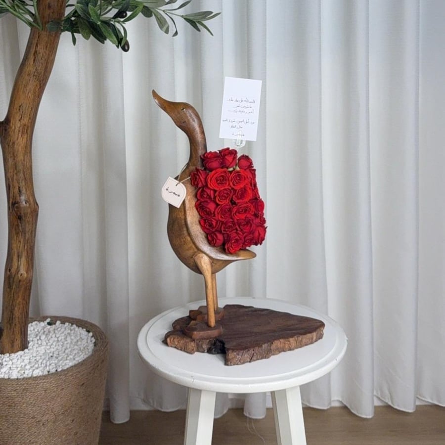 Duck with roses