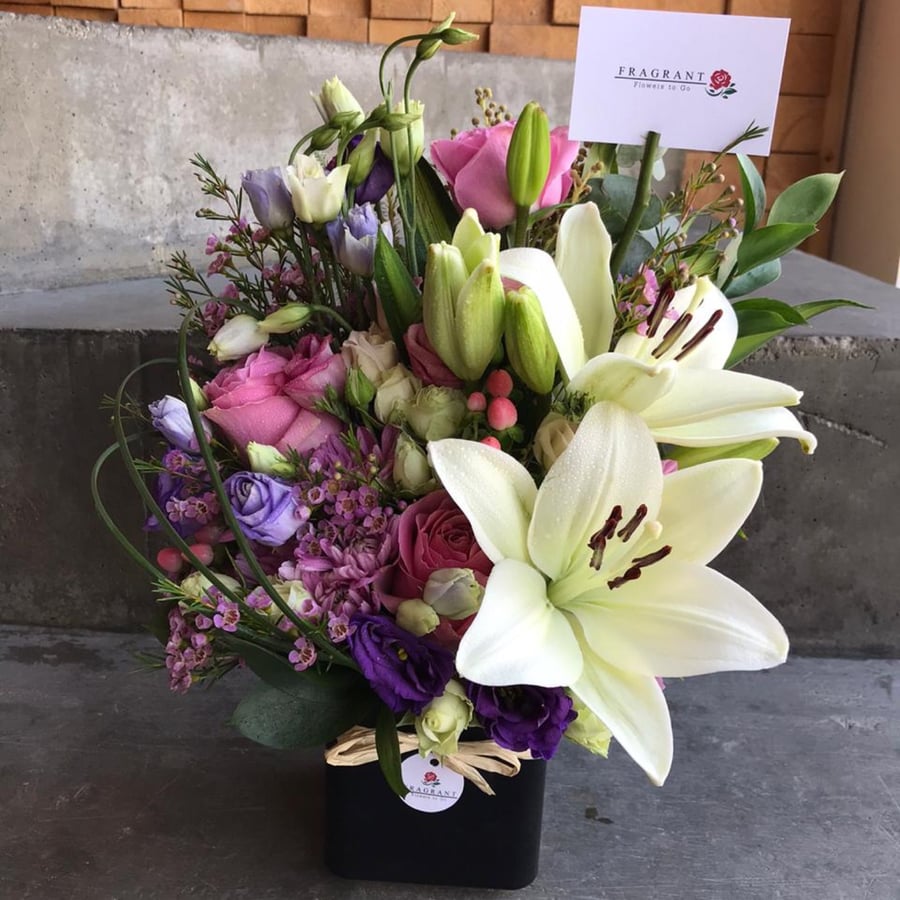 A metal base with a flower mixture