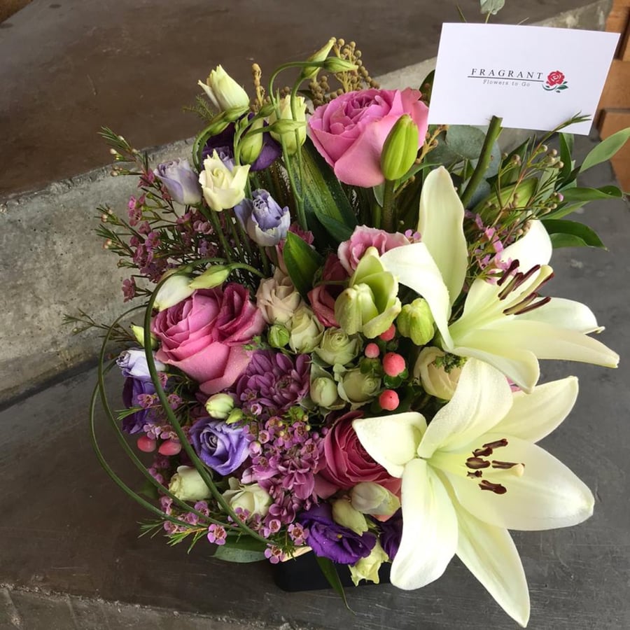 A metal base with a flower mixture