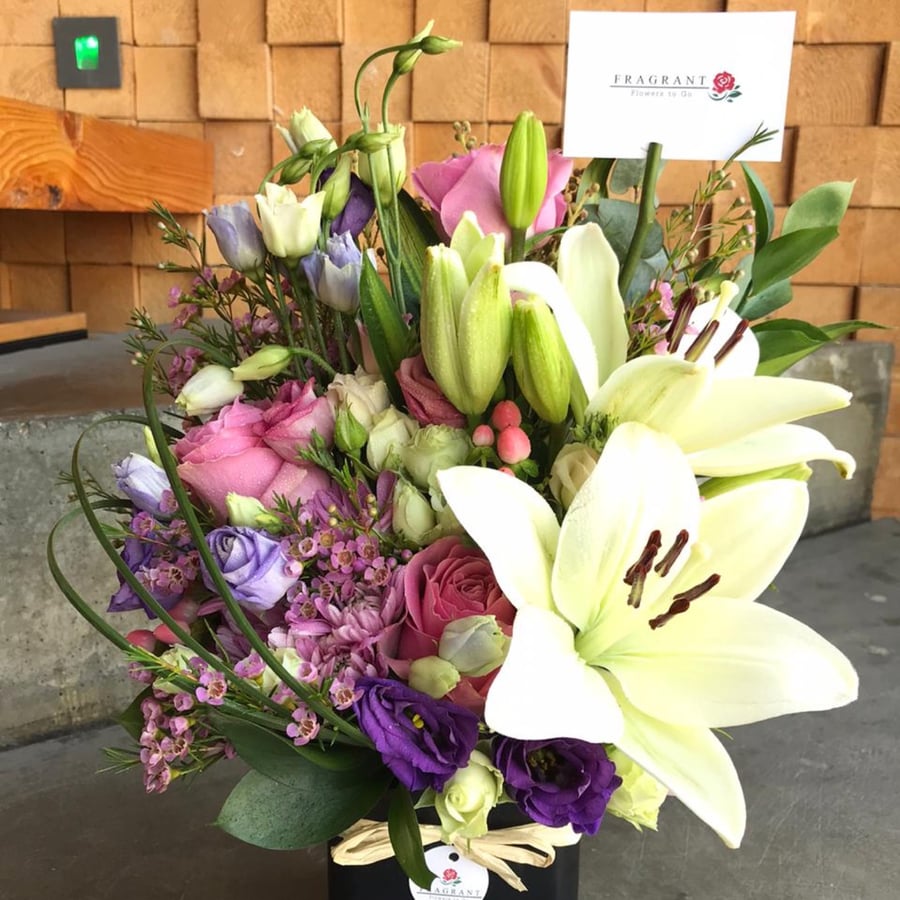 A metal base with a flower mixture