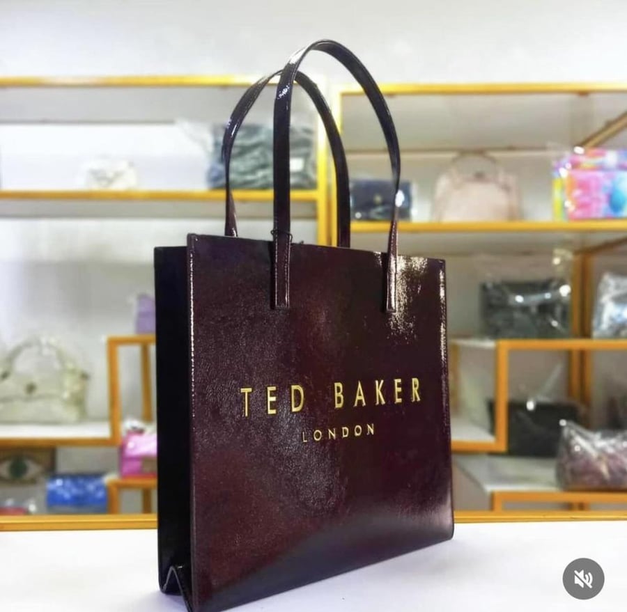 كيس وسط عنابي تيد بيكر Ted Baker