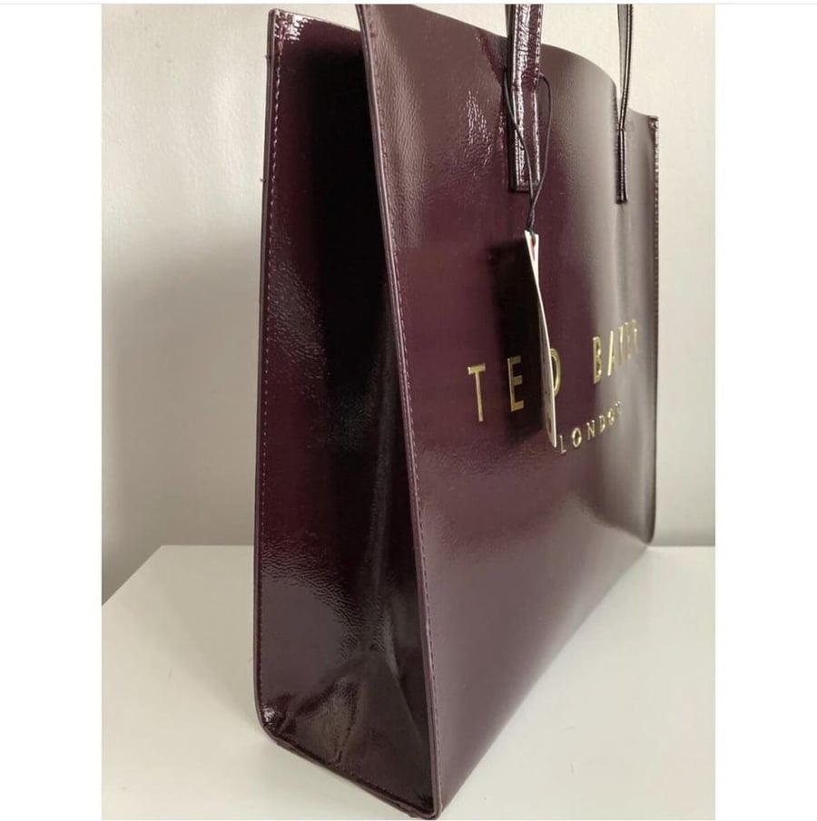 كيس وسط عنابي تيد بيكر Ted Baker
