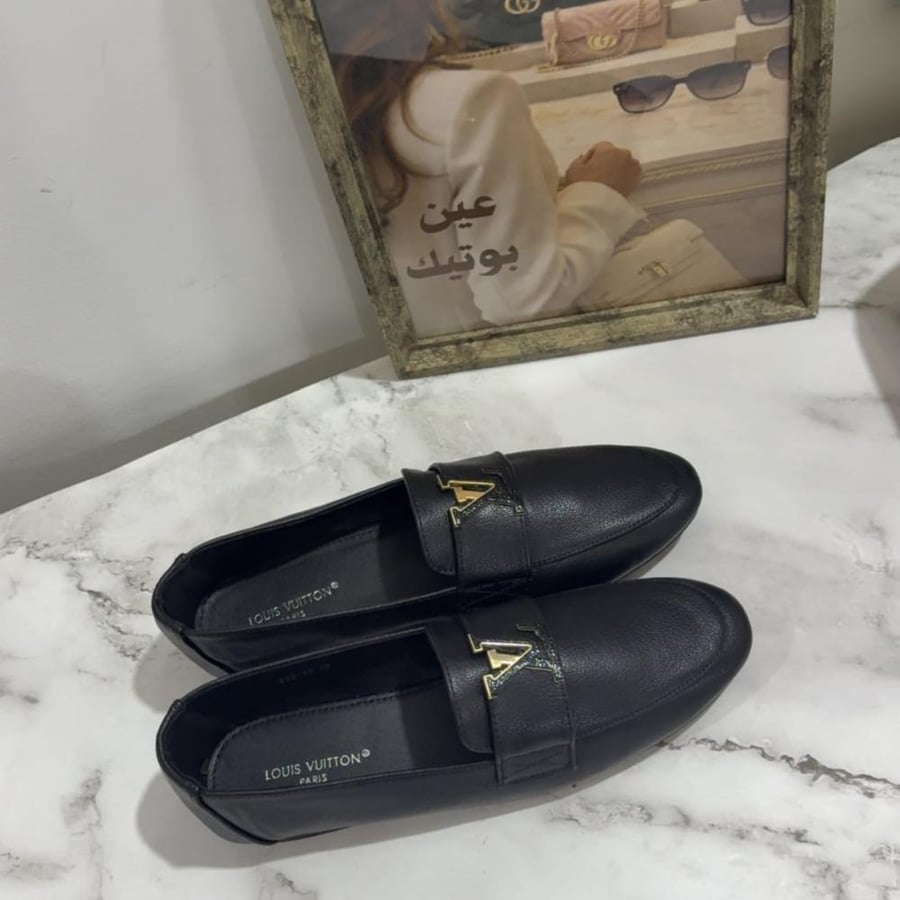 LV  لوي ڤيتون