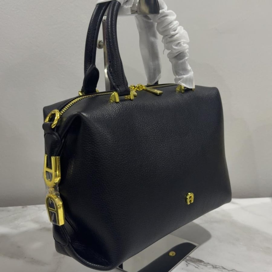 اقنر  AIGNER