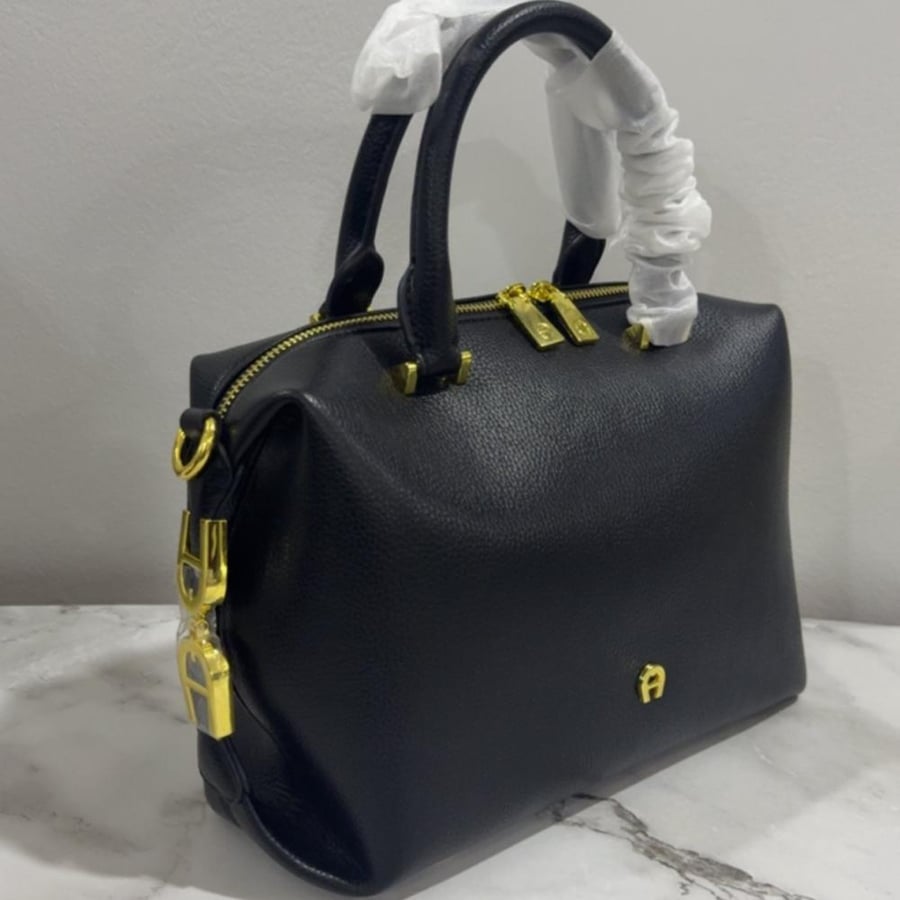 اقنر  AIGNER