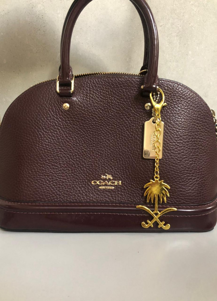 Golden bag pendant - Kingdom logo
