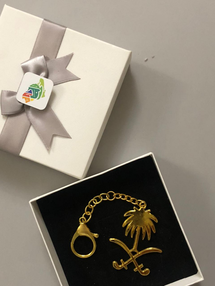 Golden bag pendant - Kingdom logo