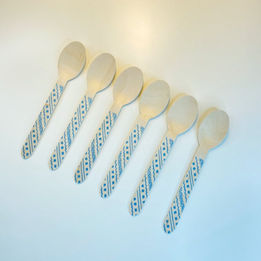 Blue carved wooden spoons