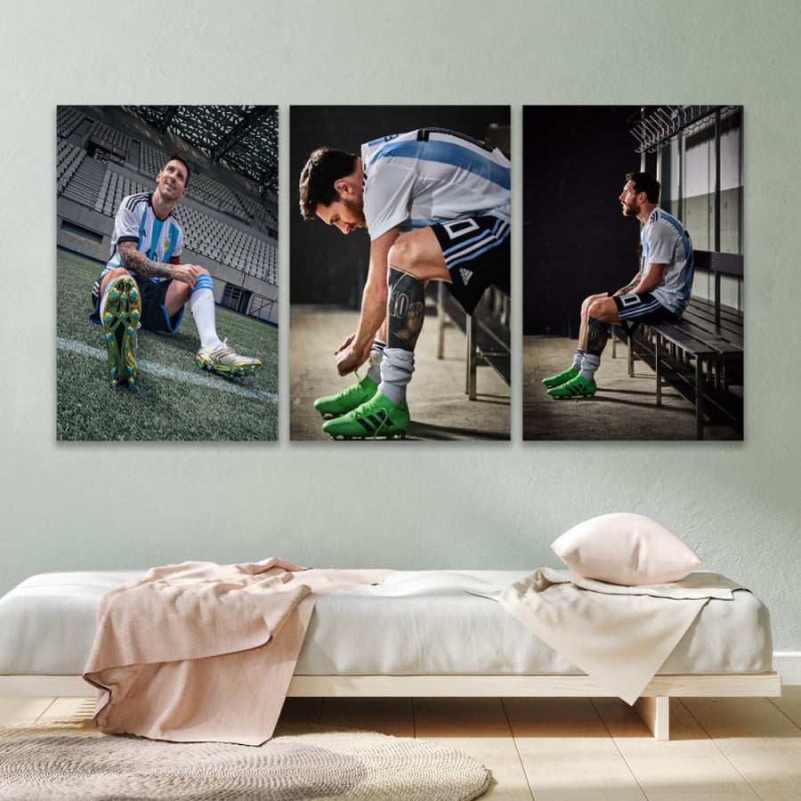Three canvas paintings of Lionel Messi
