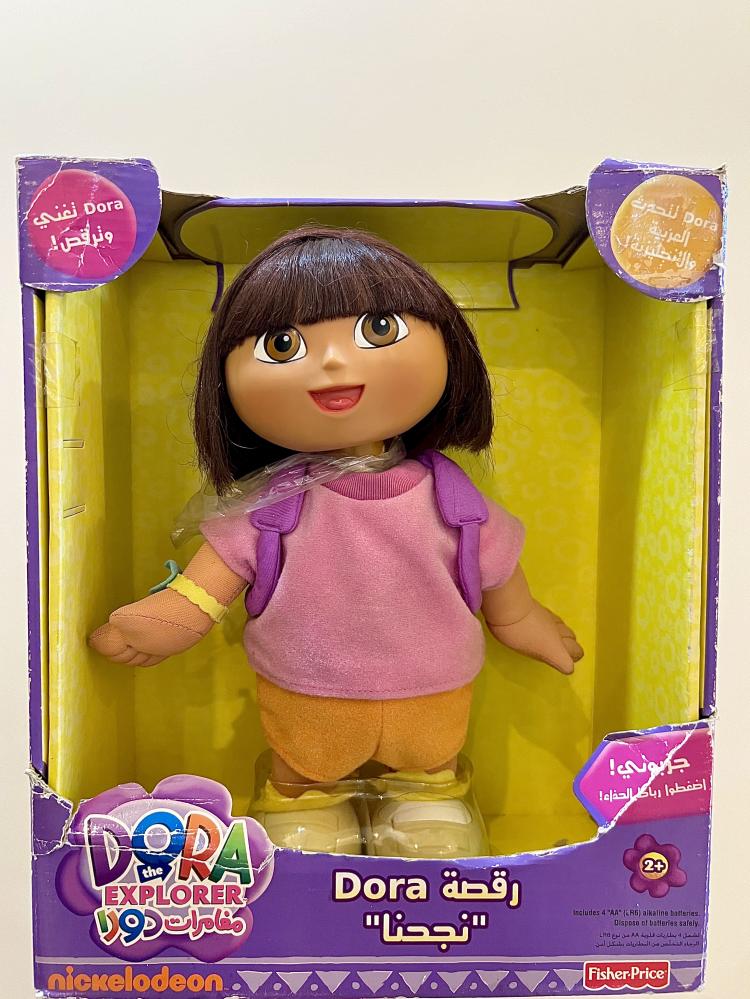 Rare person / Dora the Talking Doll character sings when pressing the button from Dora's Adventures "2012 edition" sings in both Arabic and English (original)