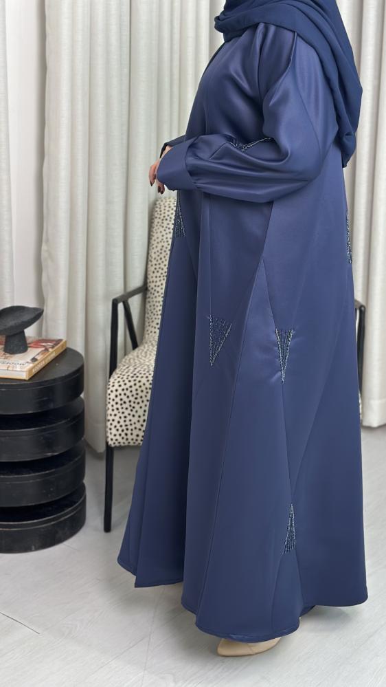 A thobe with delicate embroidery and A-line cuts