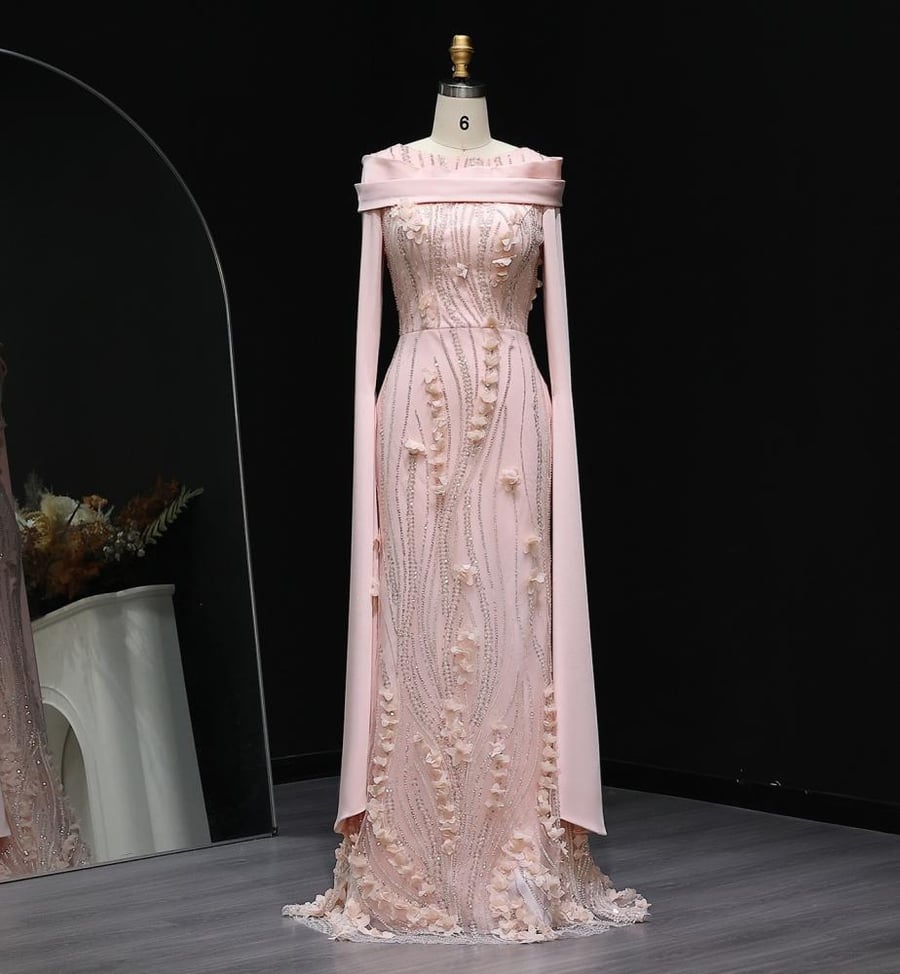 Pink evening dress with flower design and elegant cape sleeves