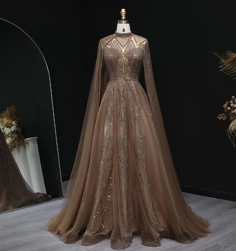 Royal evening gown with cape sleeves and luxurious crystal embroidery