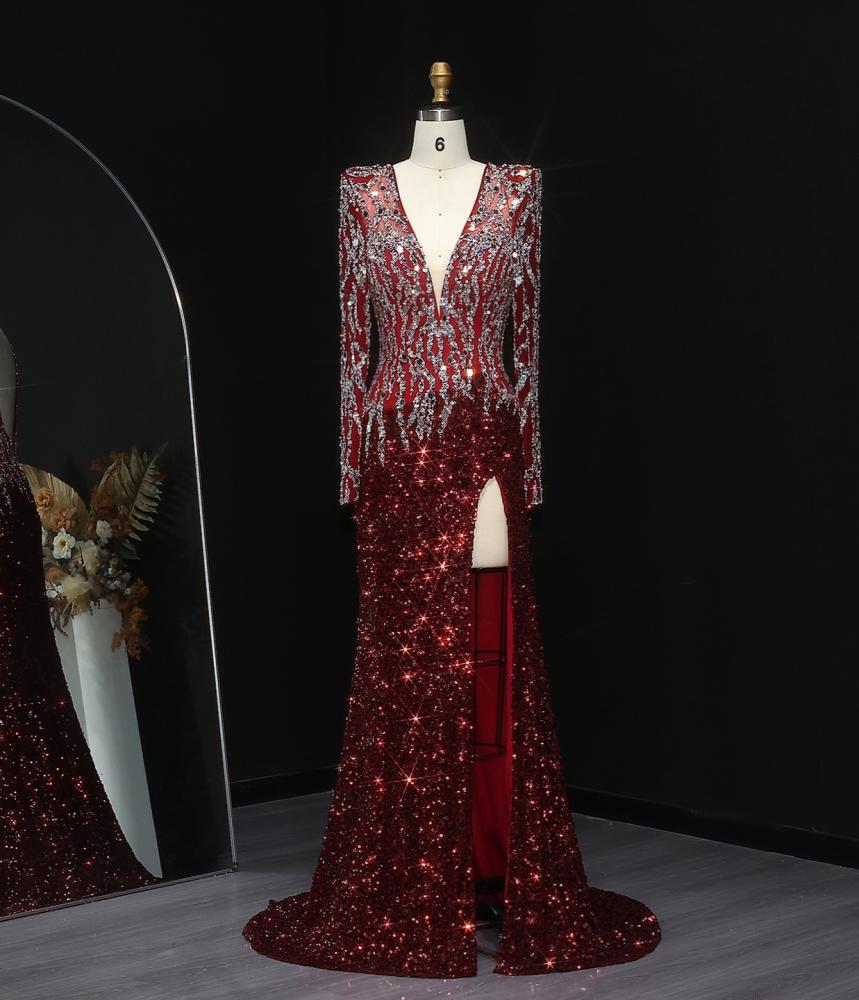 Luxury evening gown with long sleeves decorated with sequins for parties