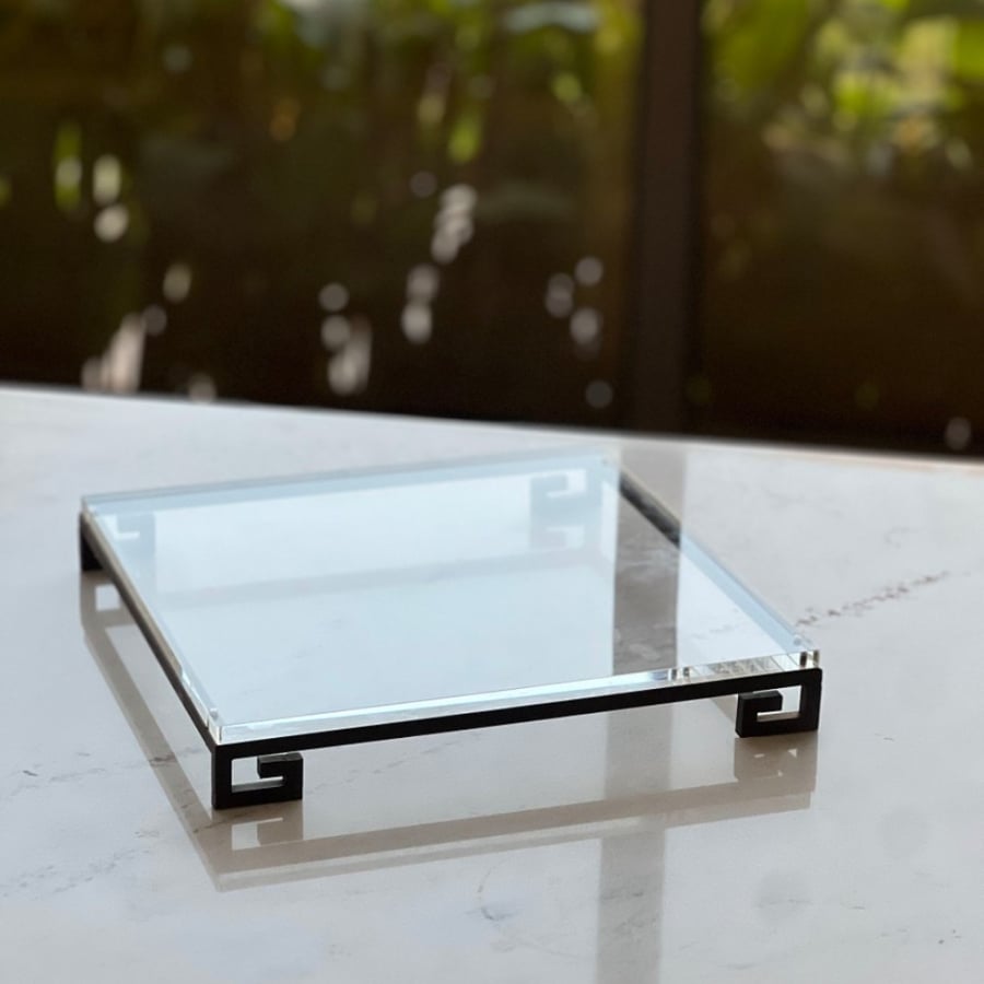 Acrylic display with metal base