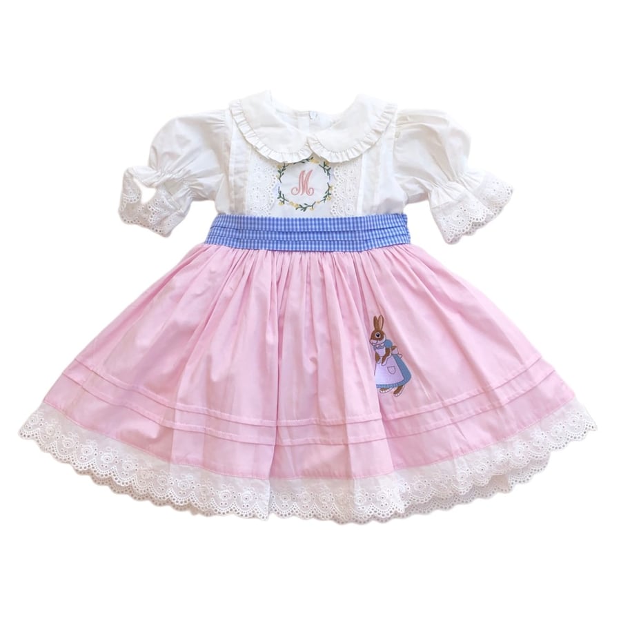 French dress embroidered with a rabbit design