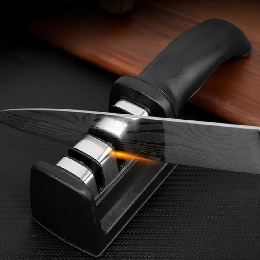 Triple-stage knife sharpener with a manual sharpening tool for all types of knives