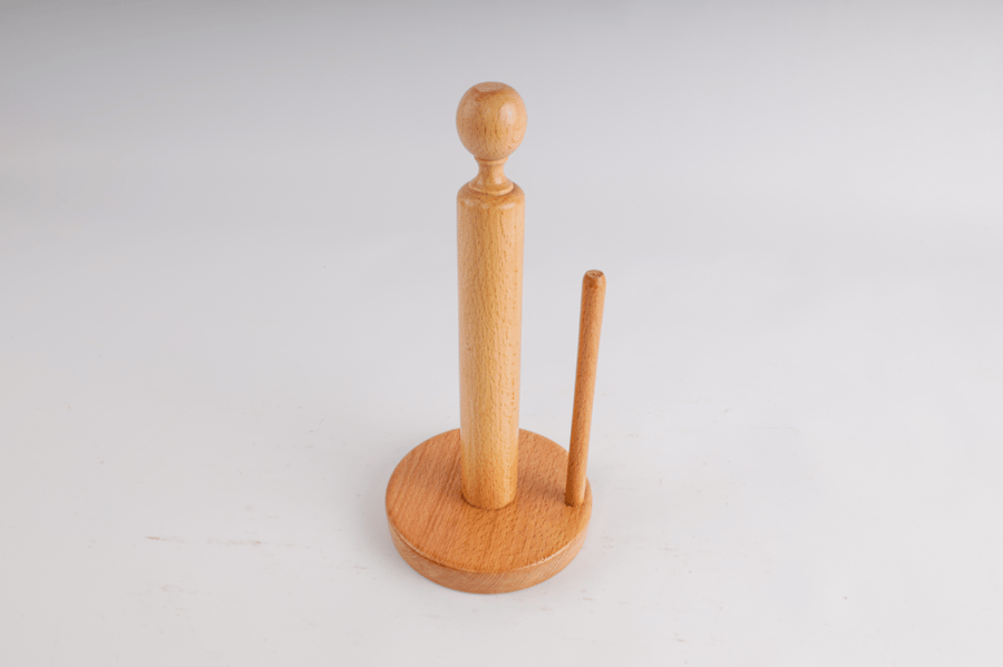 A tissue paper holder with cutter