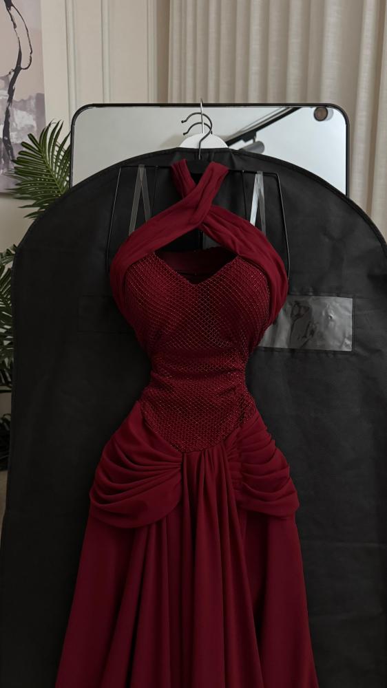 Dress long evening with oud. The fabric chiffon, dress color beige.