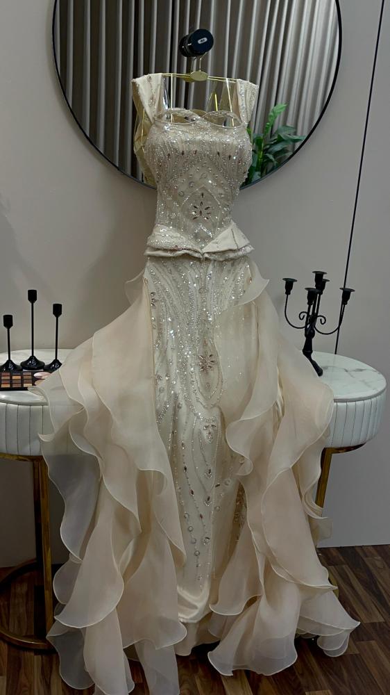 Evening dress, material crinkle and beads, beige color, long, dress tail, light.