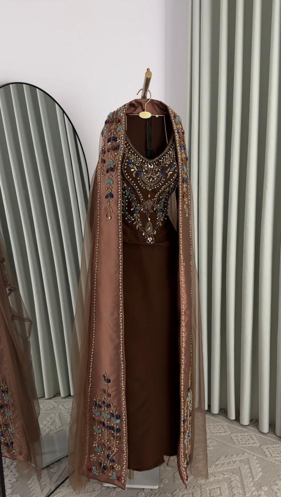 Evening dress, jacket with embroidery, and hand embroidery called Hamma