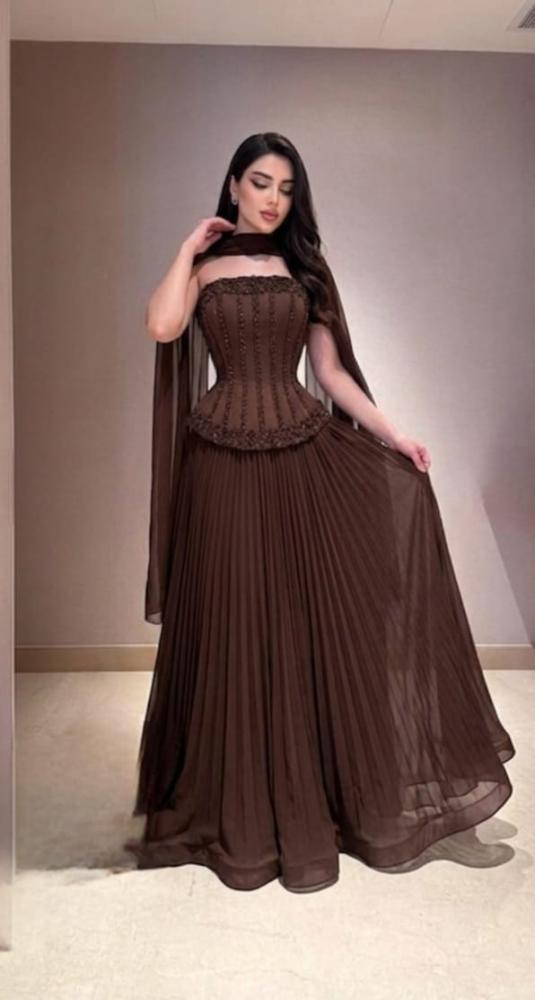 Koreeseh Barbie dress with beads and Georgiabet Plesia double flared dress.