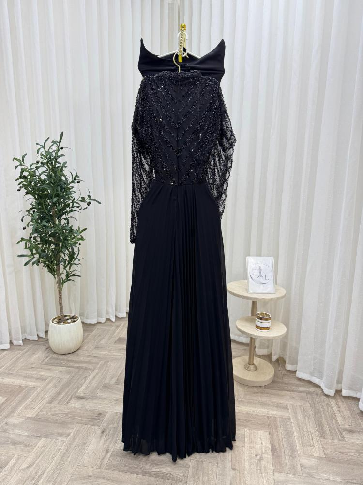 A long black fabric dress with chiffon, Barbie style, with embroidery.