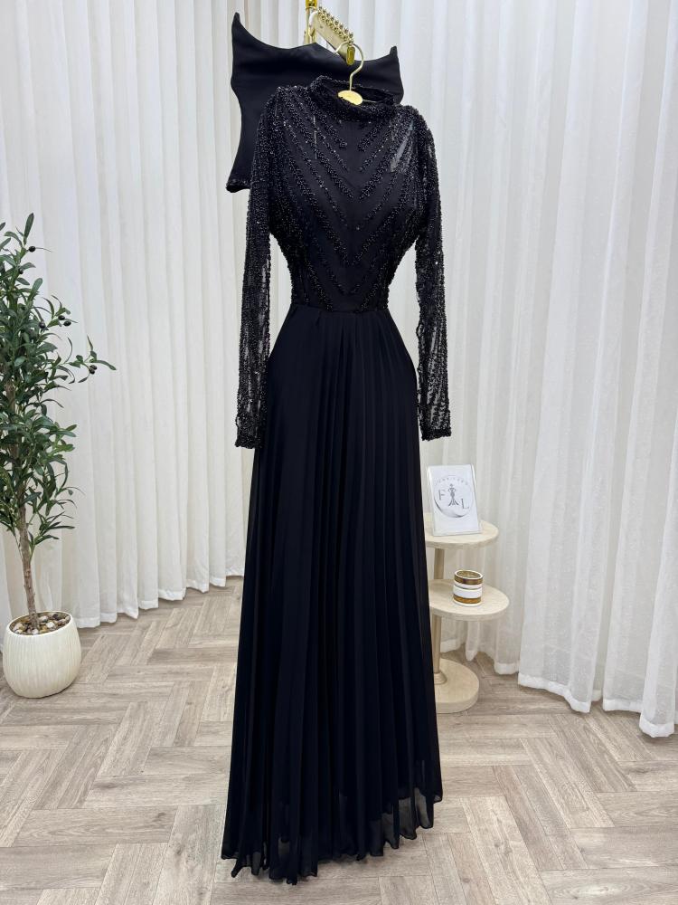 A long black fabric dress with chiffon, Barbie style, with embroidery.