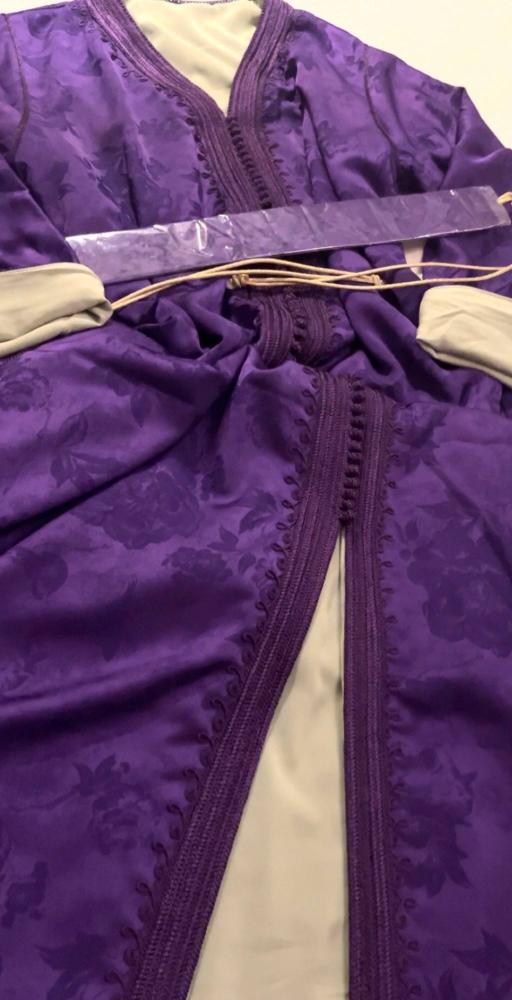 Caftan in lavender color, distinctive colors, one piece of each color to stand out, embroidered piece in front and sleeves, lined with a matching color to highlight your femininity and make you stand out.