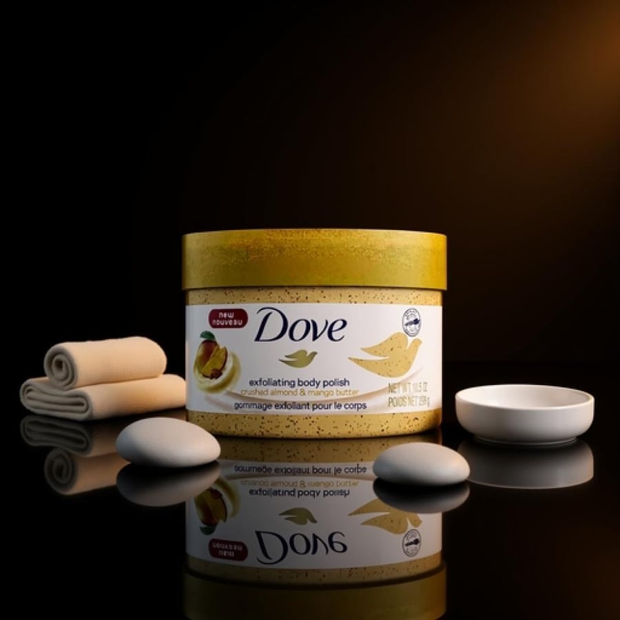 دوف مقشر الجسم باللوز المطحون وزبدة المانجو 298 جم