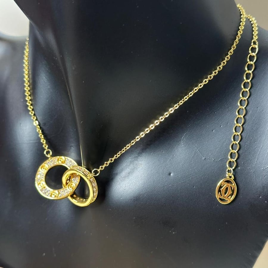 Cartier set of two gold circles – necklace and earrings