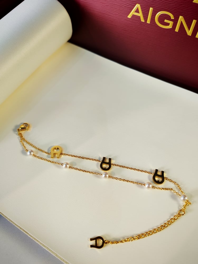 Aigner gold bracelet