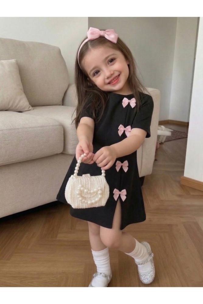 uyguntarz فستان قصير أسود للبنات مزين بفيونكة بيضاء، تصميم عصري