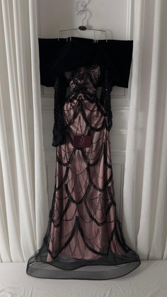 Elegant dress decorated with beads and embroidery