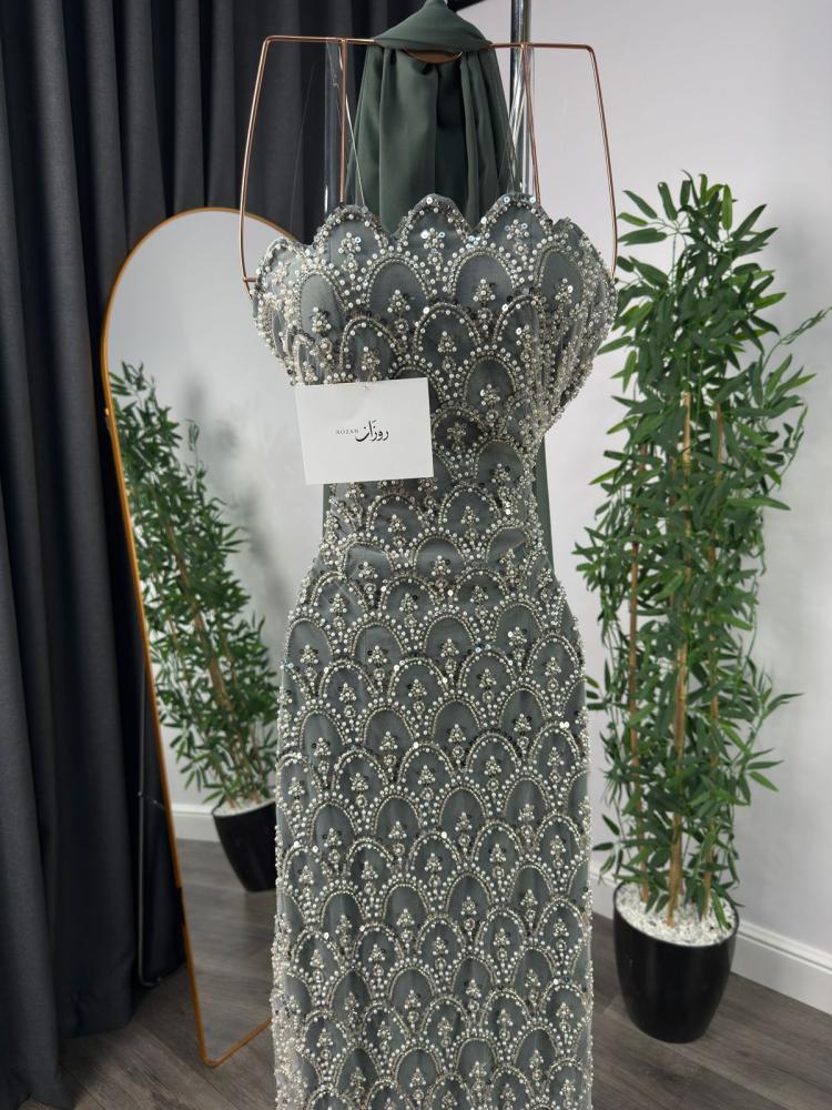 Green dress with luxurious embroidery