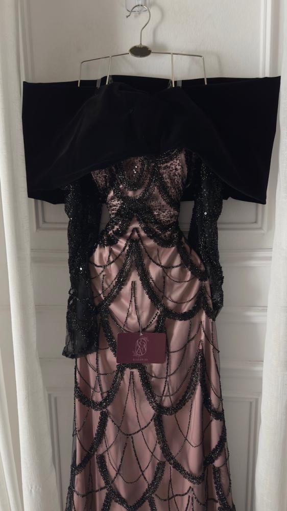 Elegant dress decorated with beads and embroidery