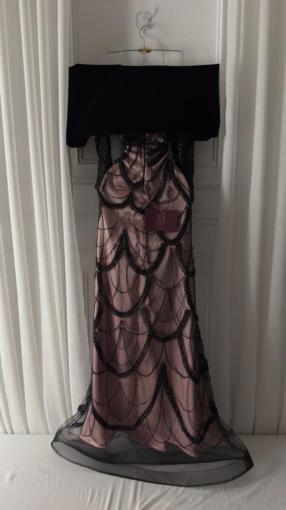 Elegant dress decorated with beads and embroidery