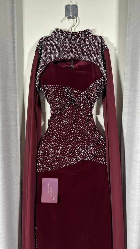 A winter evening dress made of gabardine and chiffon fabric, modest.