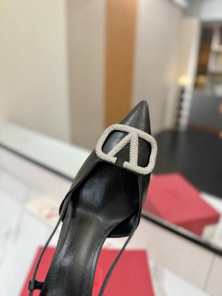 هيلز فالنتينو Valentino pointed-toe V-buckle sandals.